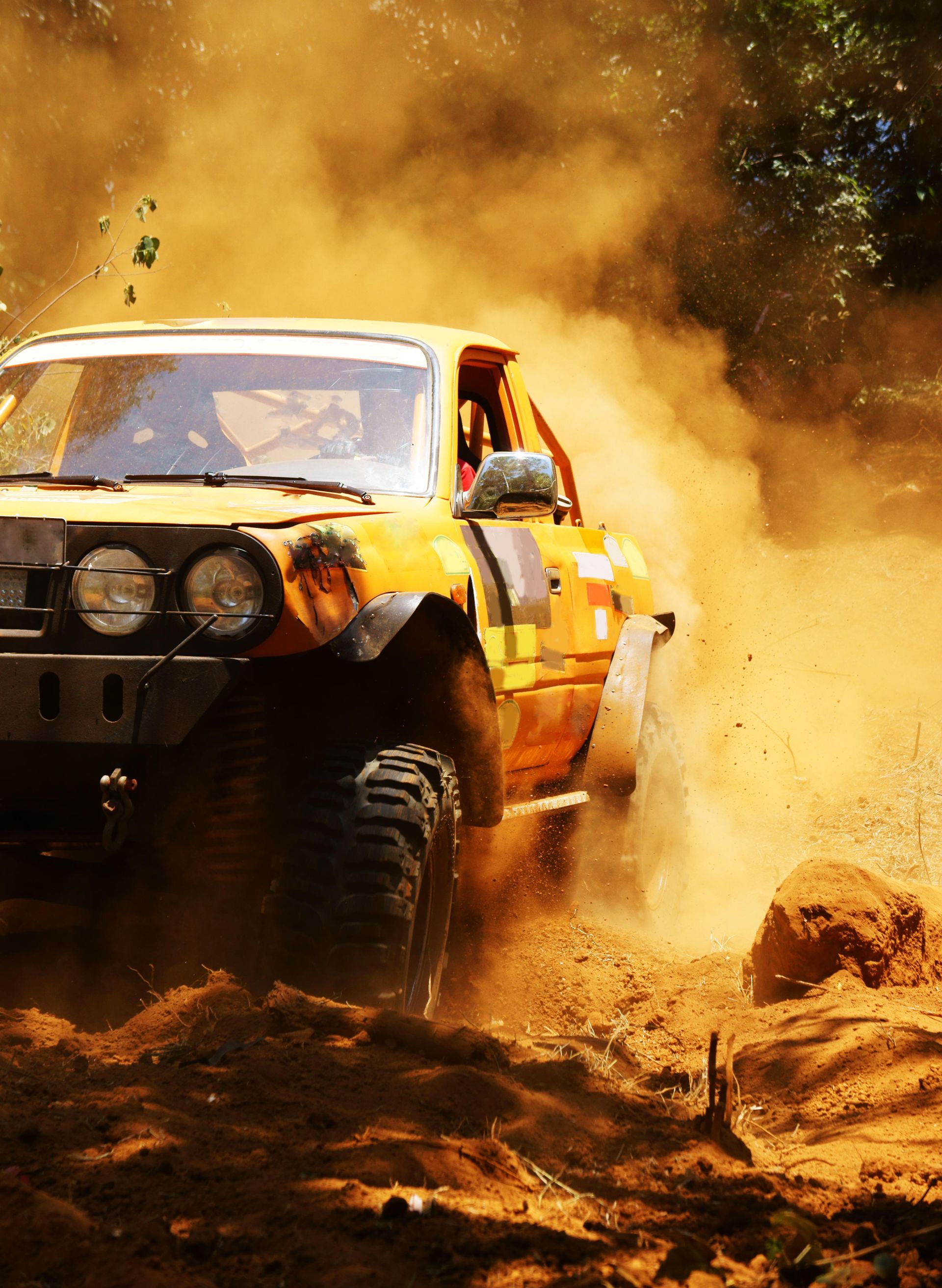 Off-road Jeep climbing rocky terrain